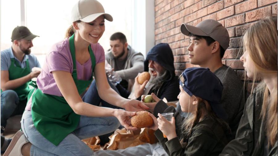 giving bread to people
