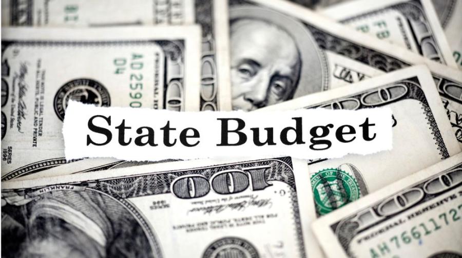 words State Budget over dollar bills