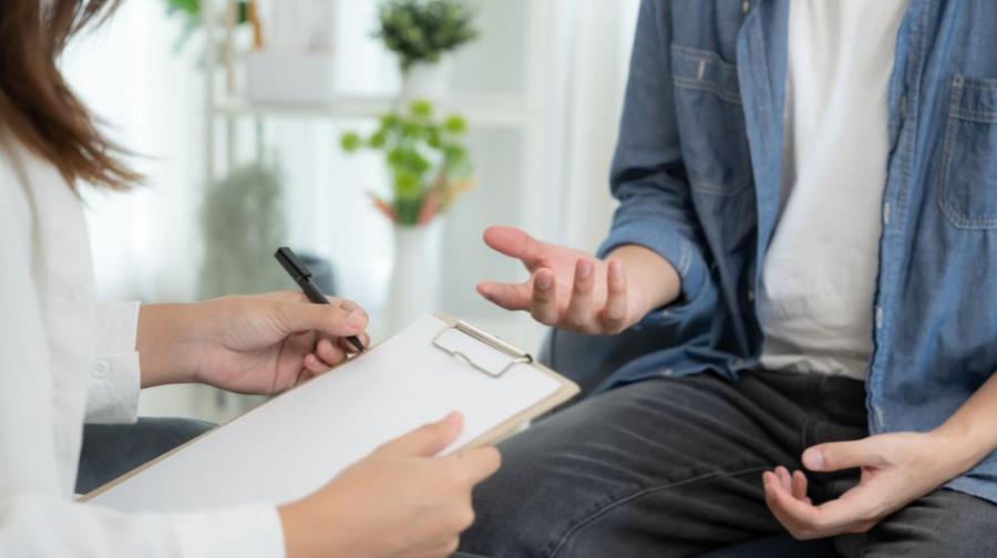 part of photo of two people meeting