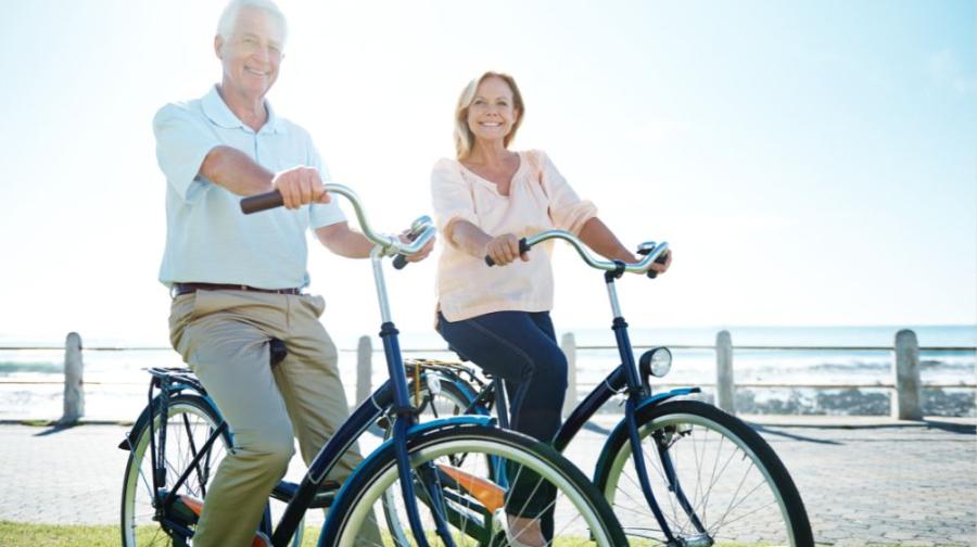 two people sitting on bicycles