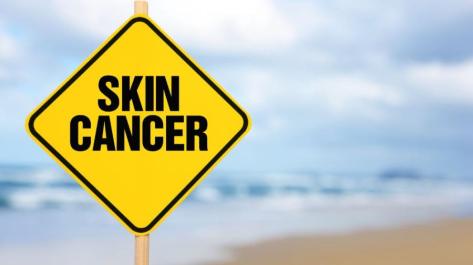 sign with words skin cancer