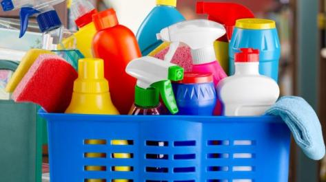 close up of basket of cleaning supplies